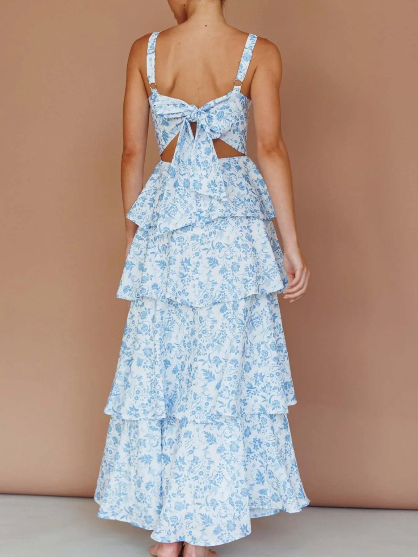 Floral layered ruffle maxi dress from Shopiebay featuring a flowy design and vibrant floral print, perfect for summer wear.