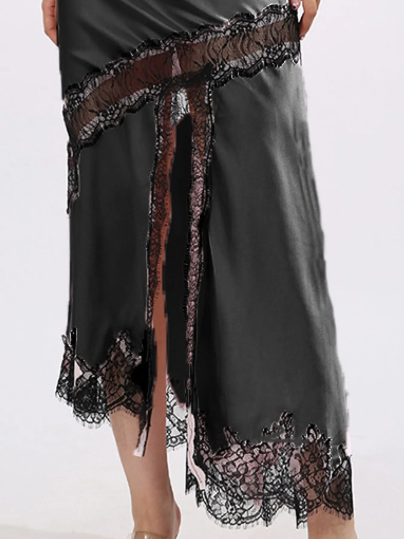 Lace trim asymmetrical midi skirt from The Fashion Celestial featuring flowing fabric and elegant design, shown on a white background.