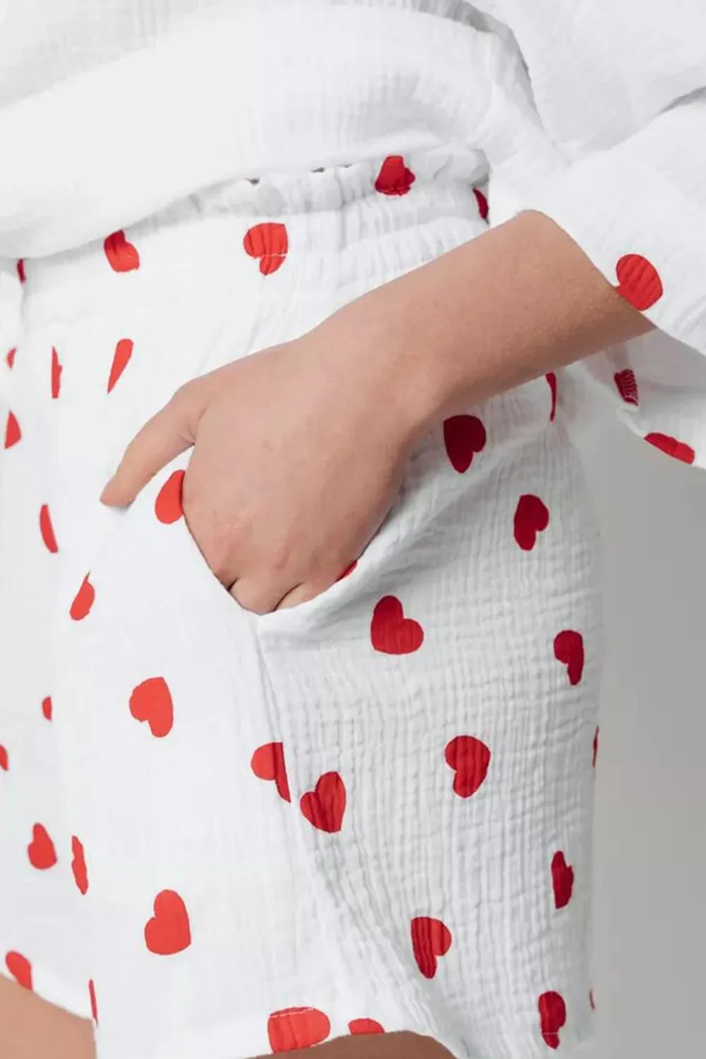 Basic Bae heart-collared neck button-down top and shorts set, featuring a playful heart design and casual fit.