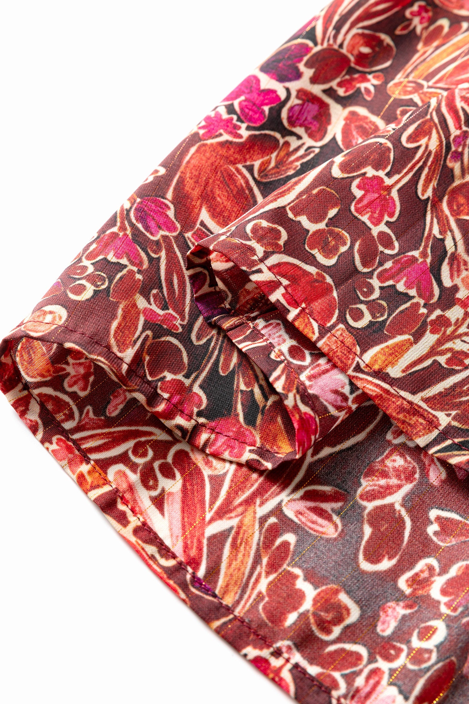 Red floral print long sleeve mini dress with high neckline and shirred details, loose fit from Wild and Free Boutique.