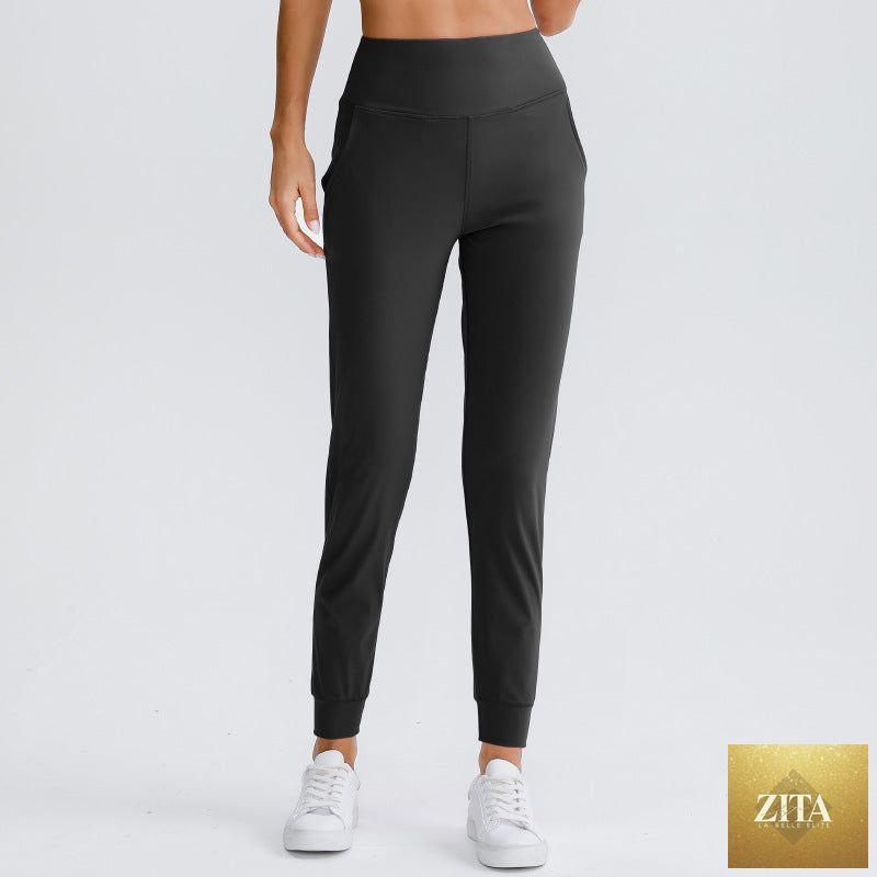 Women’s solid color elastic jogger pants by Sell My Stuff, loose slim fit yoga sweatpants with pockets for running and casual workouts.
