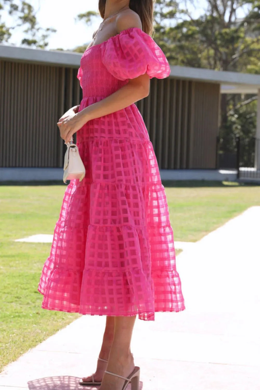 Off shoulder short puff sleeve midi dress by Shopiebay, featuring a fitted bodice and flowing skirt in soft fabric, perfect for summer wear.