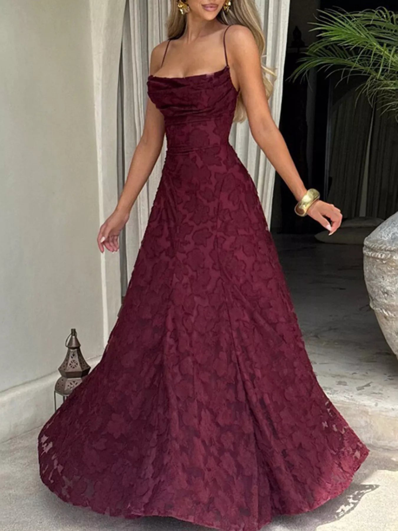 Lace spaghetti strap maxi dress from Shopiebay featuring delicate lace fabric and a flowing silhouette.