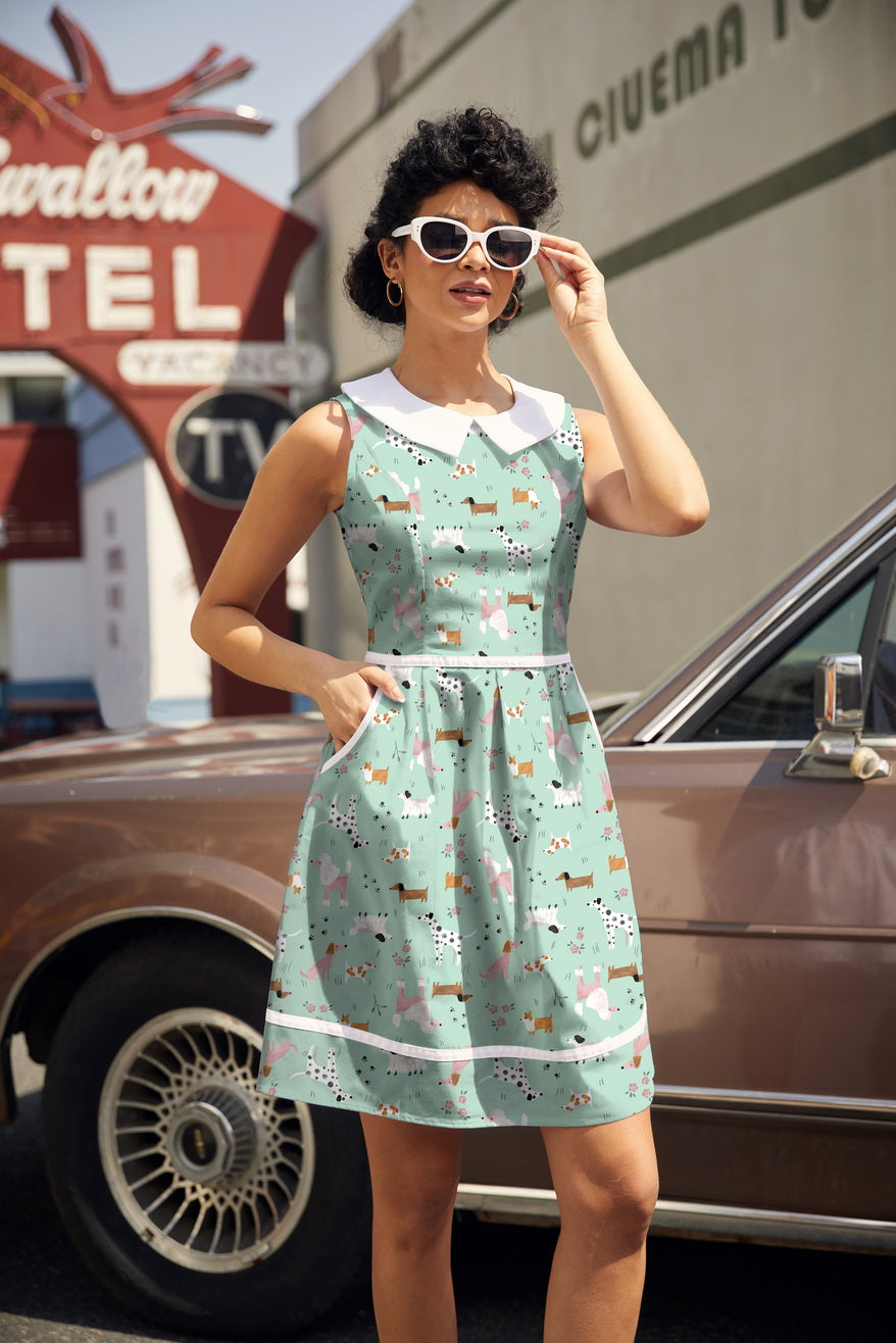 Retrolicious dogs collared dress with floral patterns, sleeveless design, and bow accents perfect for stylish small dogs.