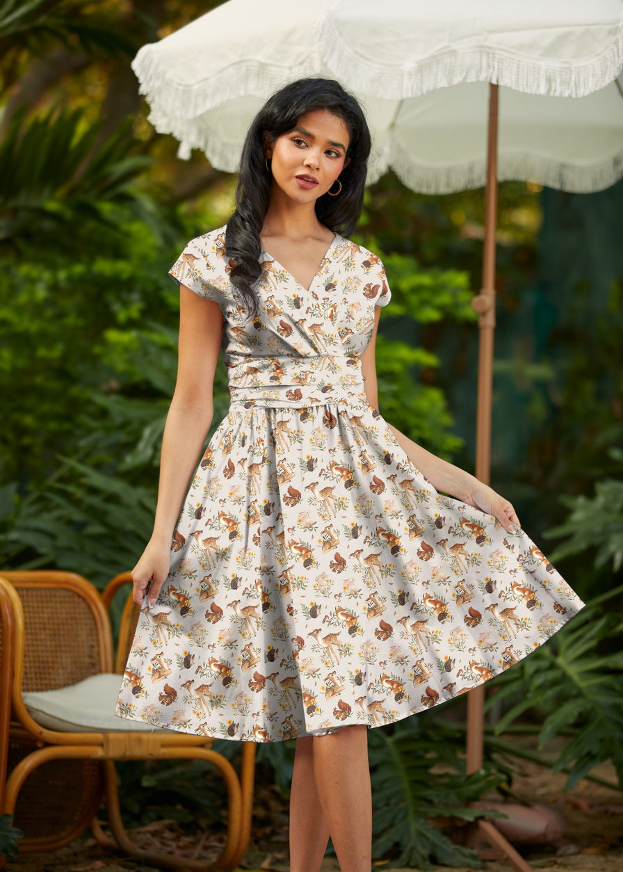 Retrolicious Woodland Animals Greta Dress featuring a charming print of woodland creatures and a cute, vintage-inspired design.