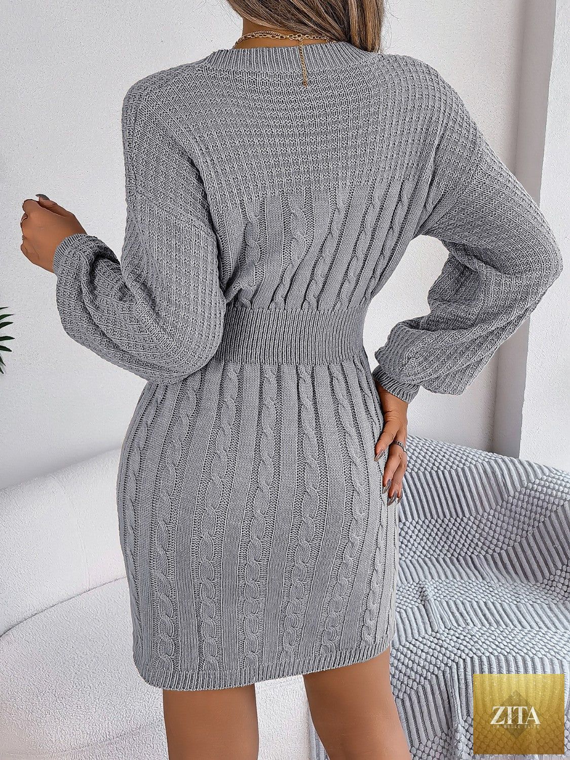 VYSN cable-knit sweater dress with cutout round neck and slit detail, stylish and cozy fashion piece for women.