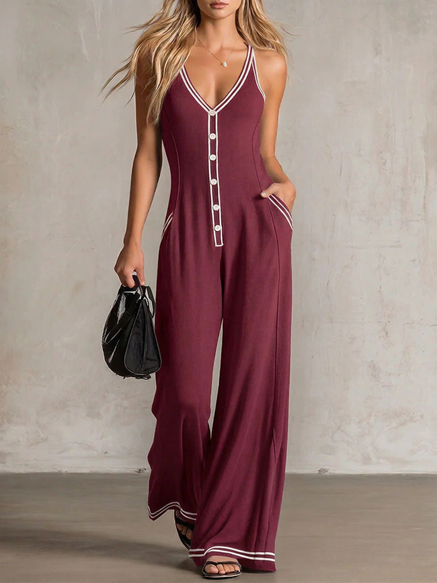 Women's V-neck backless wide-leg jumpsuit by FitiqueFit, high waist casualwear, shown in a relaxed fit with flowing fabric.