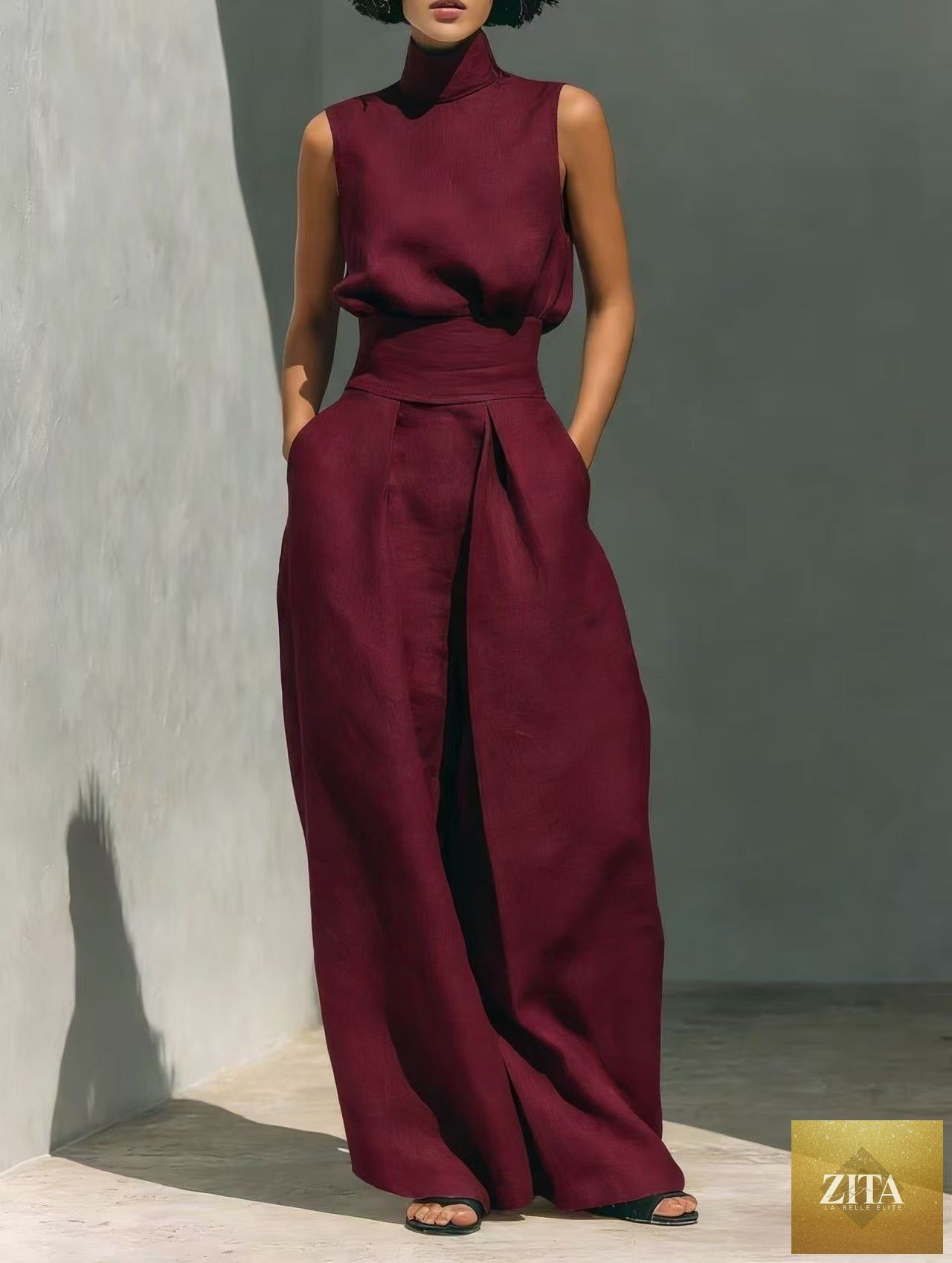 Women's linen-blend high-neck sleeveless top and wide-leg pants set, stylish two-piece outfit by MERIDGE shown on a model.