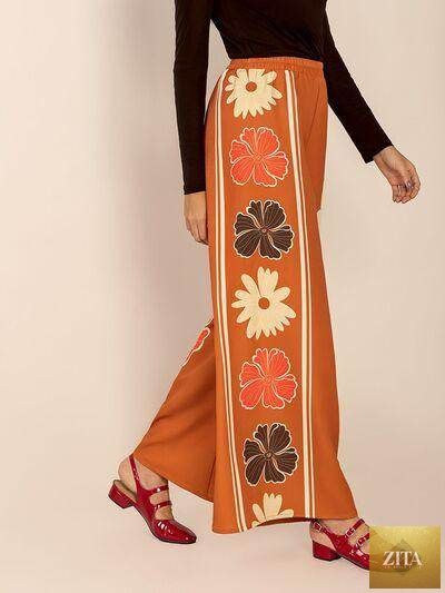 Printed elastic waist wide-leg pants by Selvanelle featuring a comfortable fit and stylish design.
