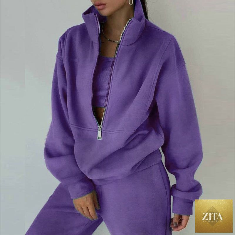 Women's full-zip cropped sweatshirt and wide-leg fleece pants two-piece set by MERIDGE, shown in a casual, comfortable style.