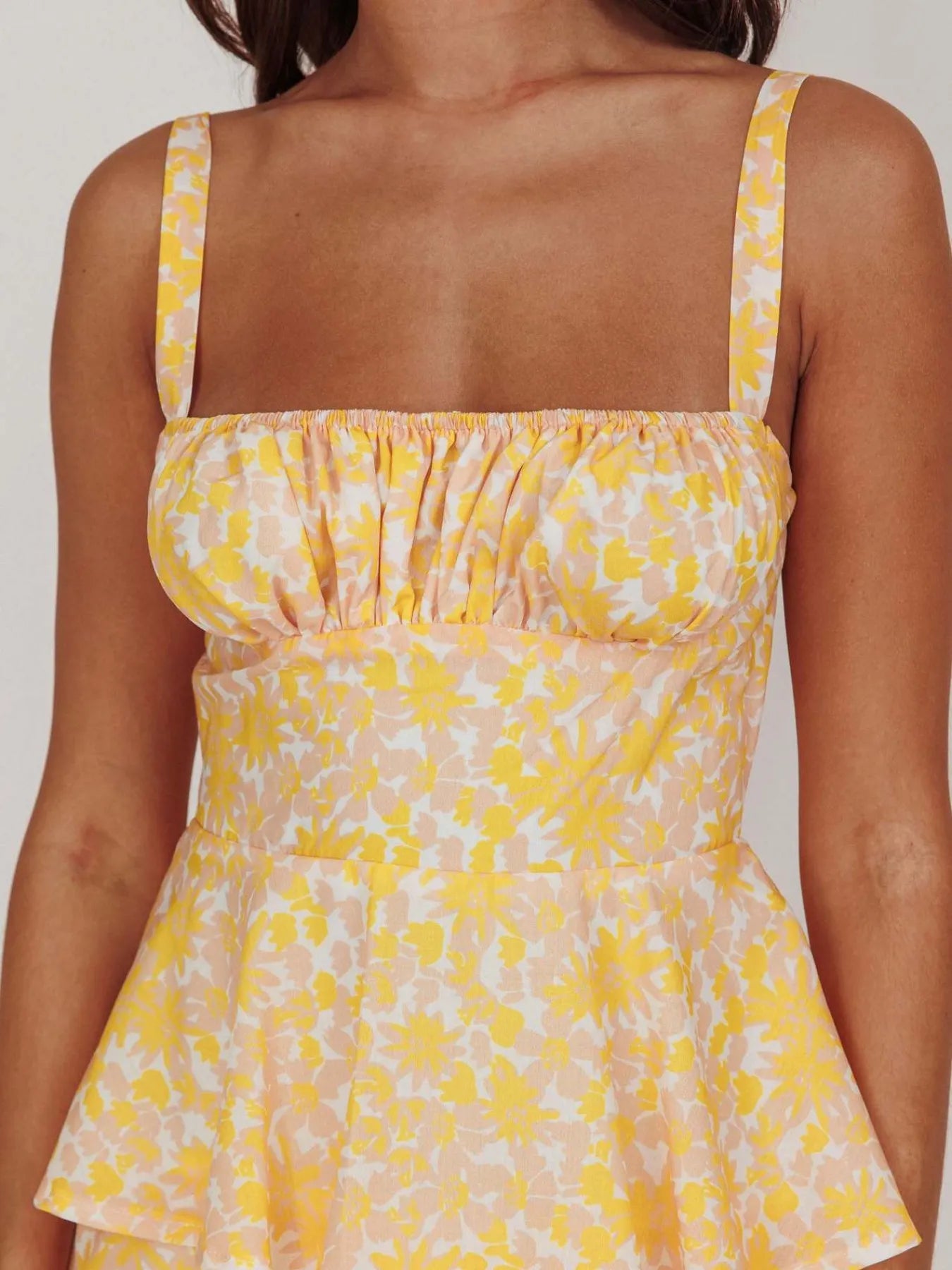 Floral layered ruffle maxi dress by Shopiebay featuring a flowing silhouette and vibrant floral pattern.