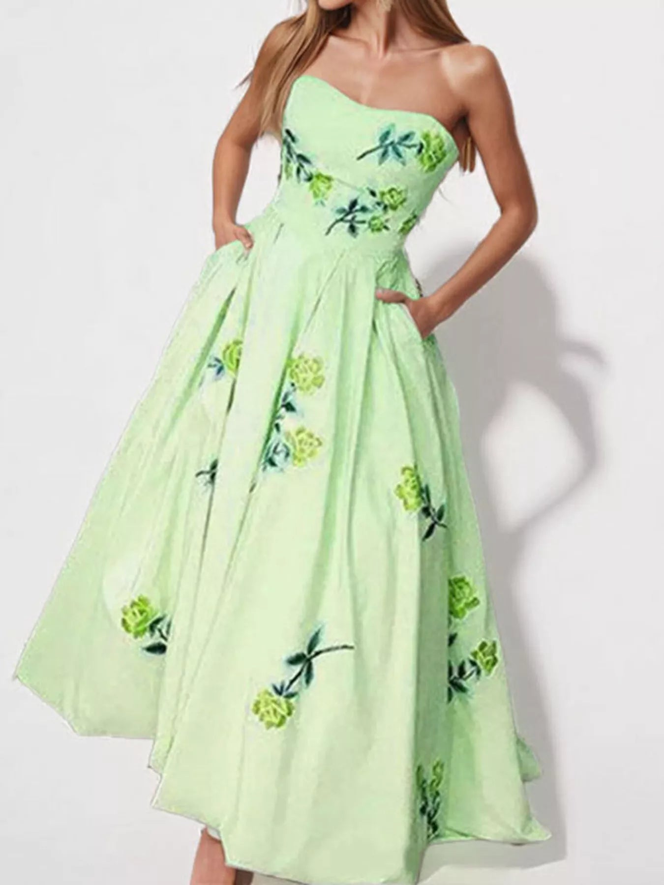 Floral print tube maxi dress by Shopiebay featuring vibrant colors and a fitted bodice, flowing maxi skirt, perfect for summer wear.
