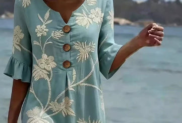 Women's casual FitiqueFit resort v-neck dress with coconut print, loose fit, three-quarter sleeves, perfect for warm weather.