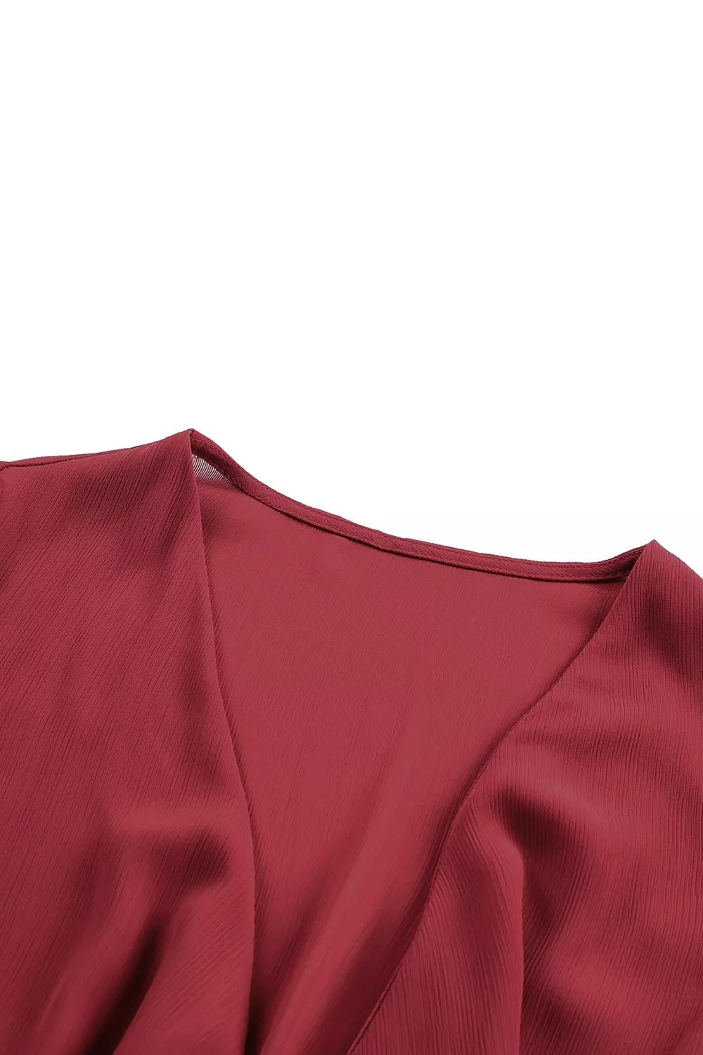 Elegant tie-front ruffle mini dress with smocked waist from Shopiebay, featuring a stylish, feminine design and lightweight fabric.