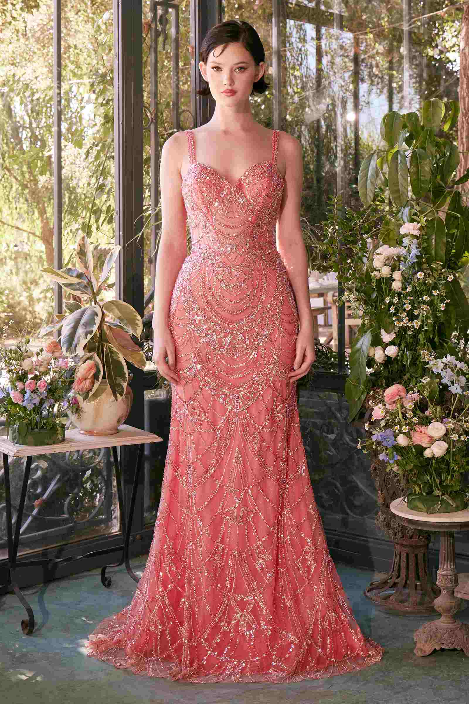Fitted coral beaded evening gown by Andrea & Leo, designed for elegant occasions, with intricate beadwork and a sleek silhouette.