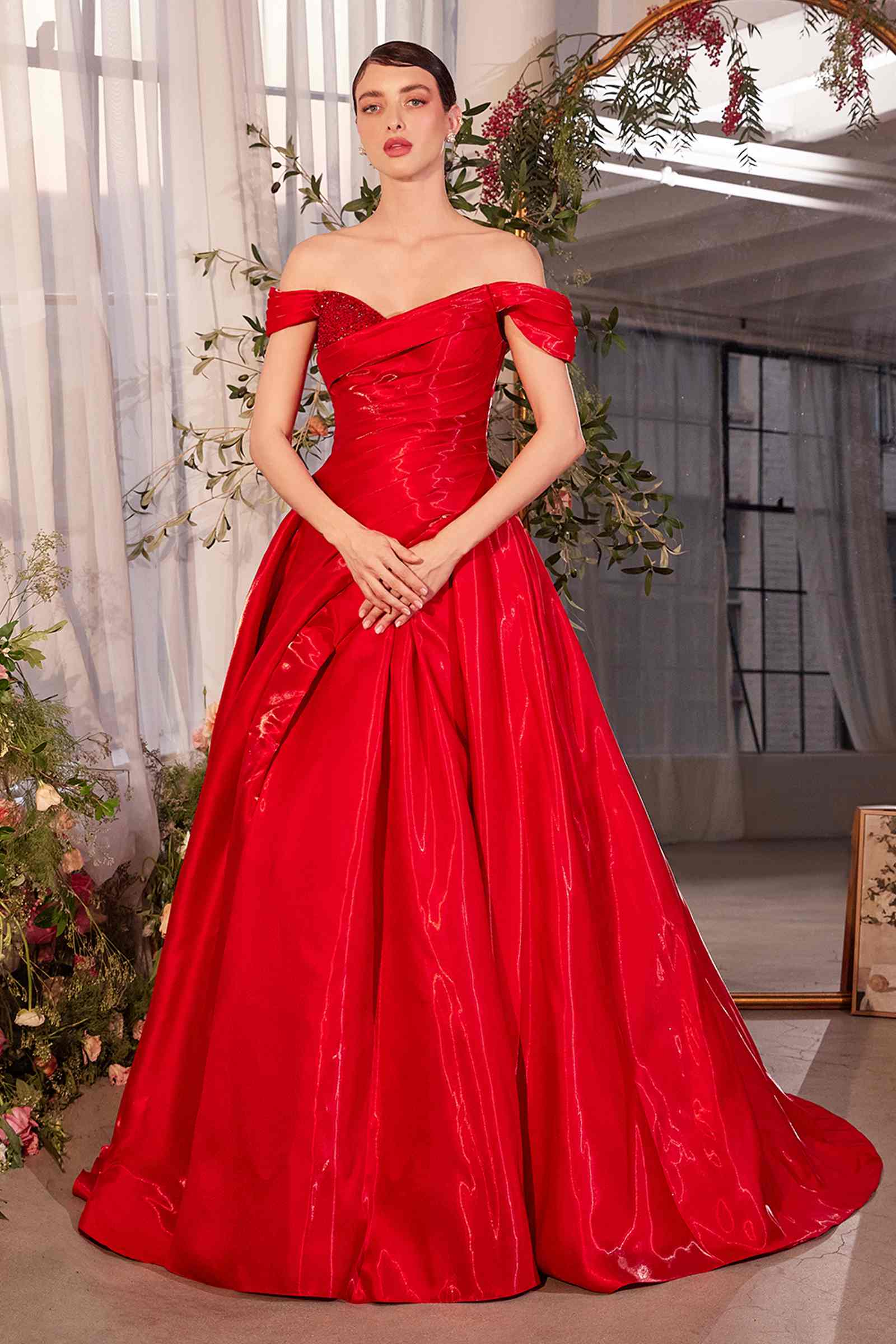 Off-shoulder red organza ball gown dress by Andrea & Leo, featuring elegant flowing fabric and a formal evening style.