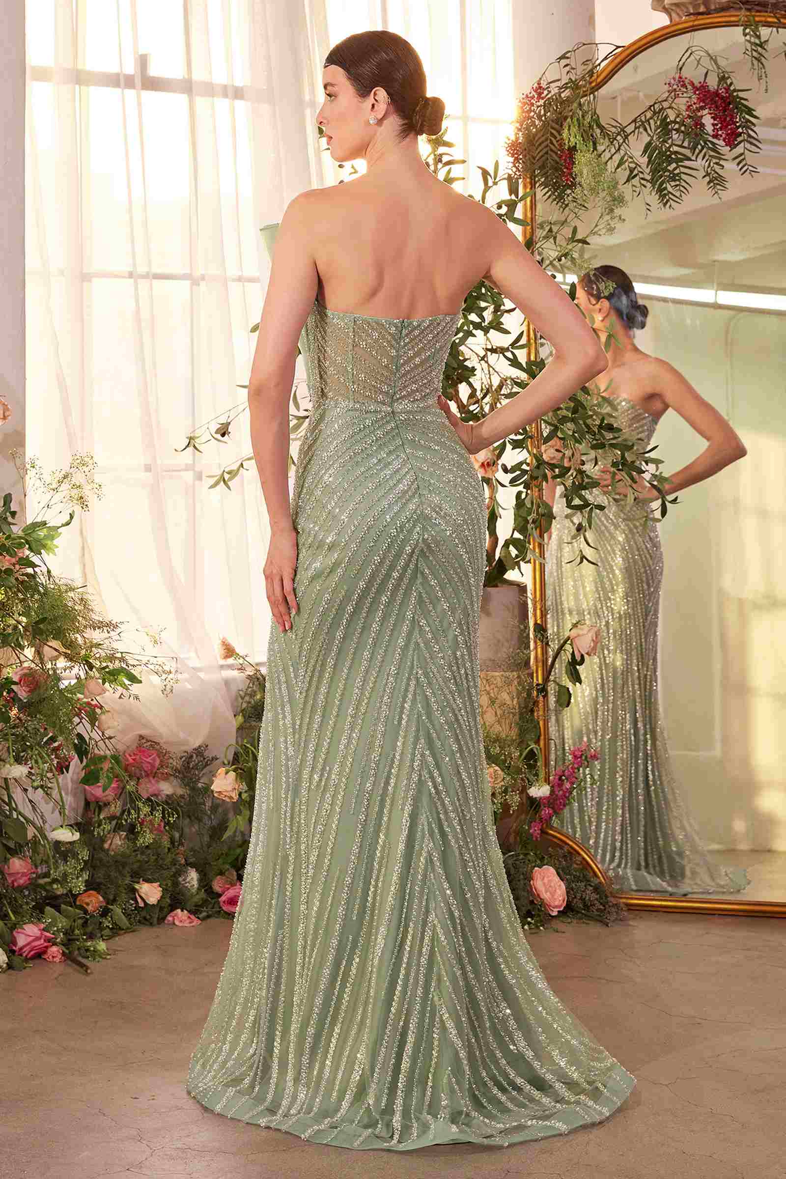 Andrea & Leo A1436 pearl gown featuring a pleated fan bodice and fitted silhouette, shown from the back with elegant design details.
