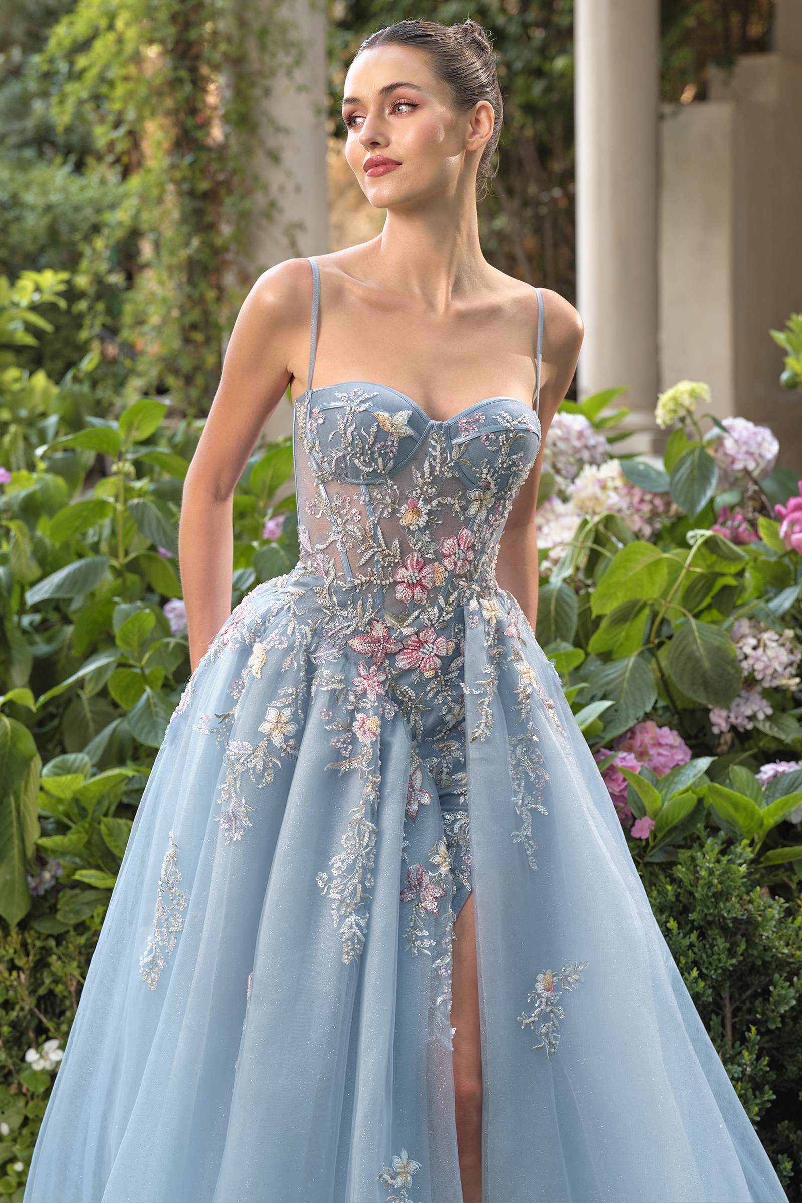 Blue Andrea & Leo A1490 strapless prom ball gown featuring a flowing skirt and elegant design, perfect for formal events.