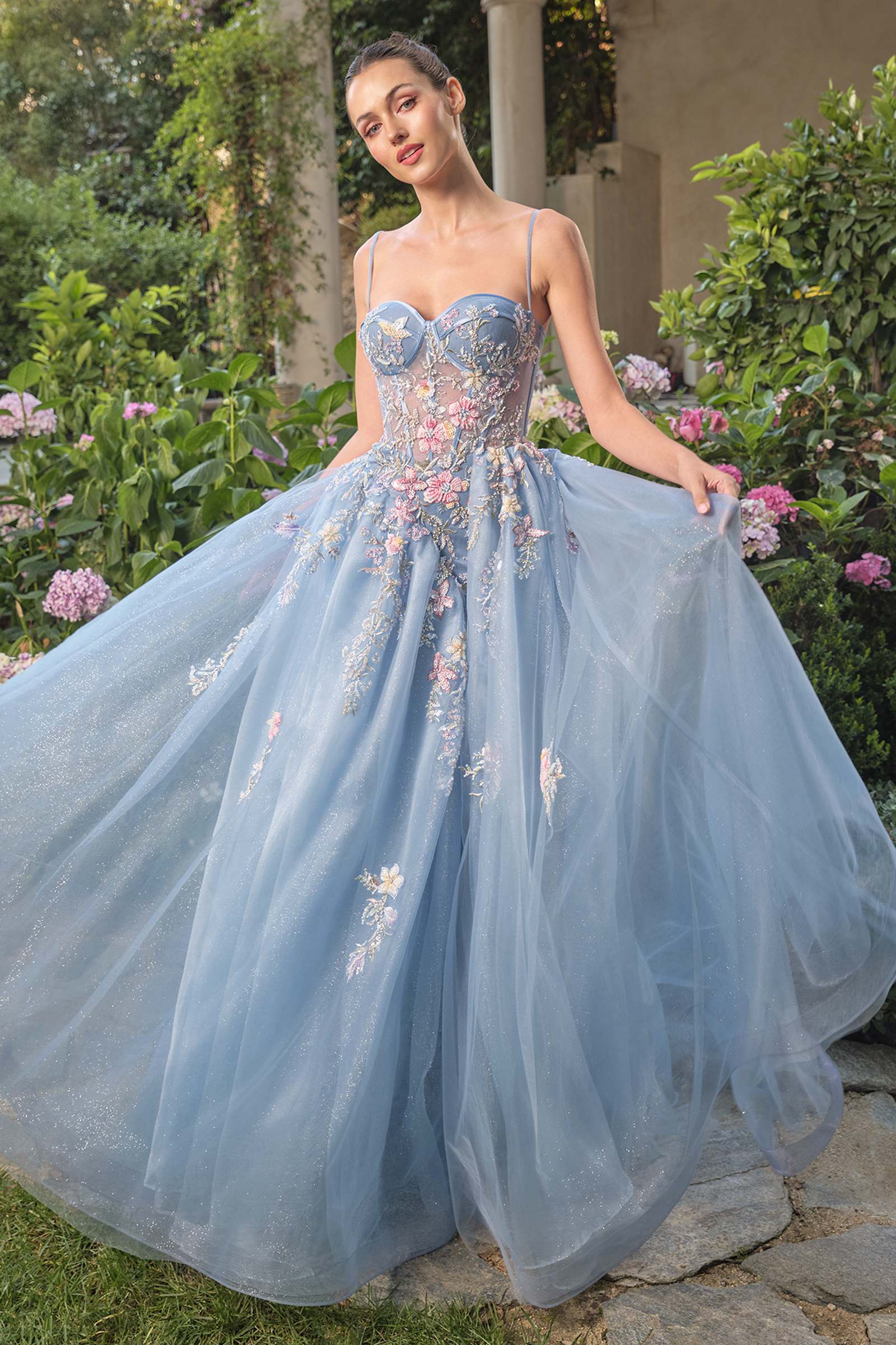 Blue Andrea & Leo A1490 strapless prom ball gown with whimsical design, elegant fit, and flowing skirt for special occasions.
