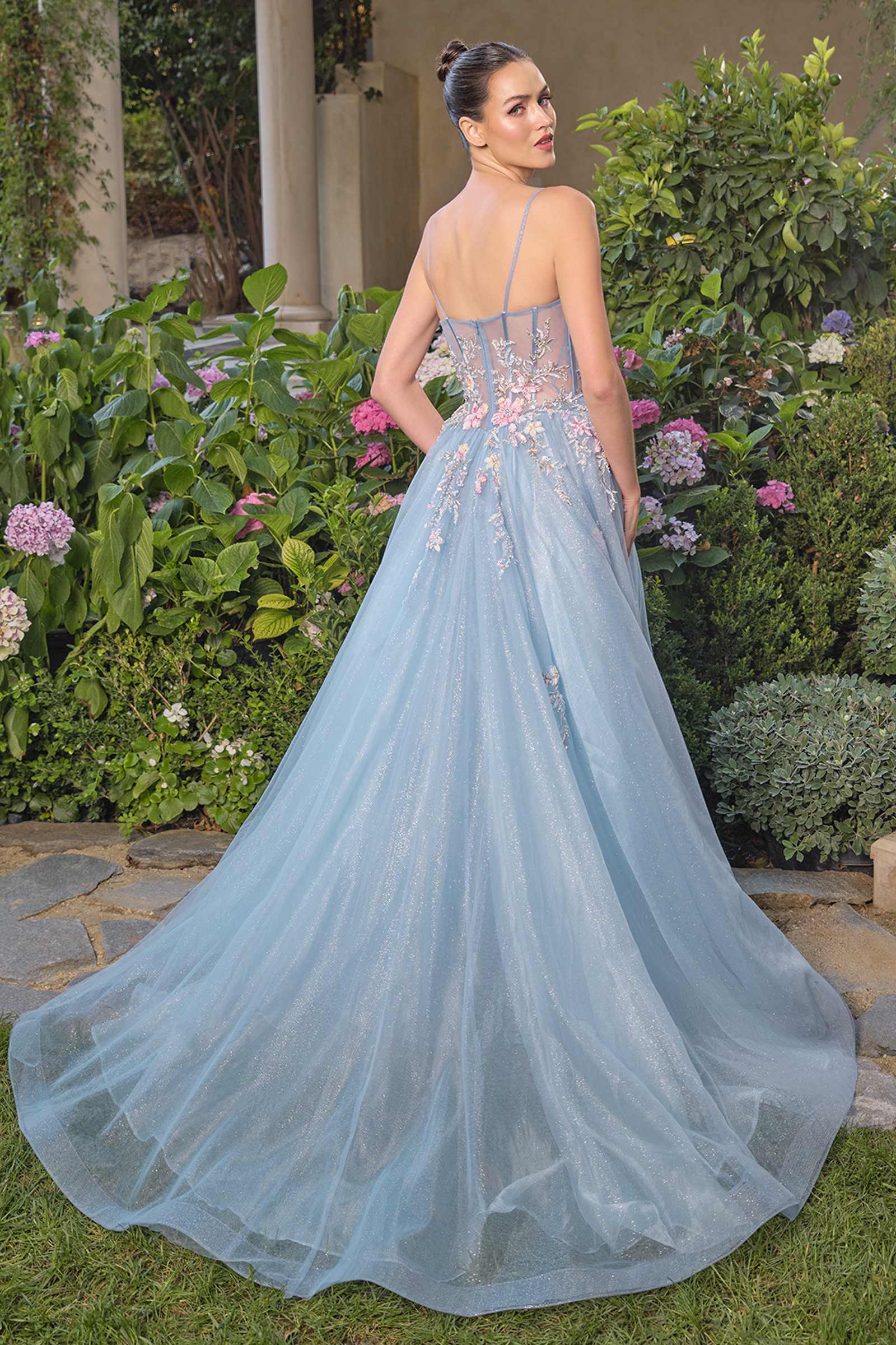 Blue Andrea & Leo A1490 strapless prom ball gown with whimsical design, shown from the back. Elegant formal dress for special occasions.