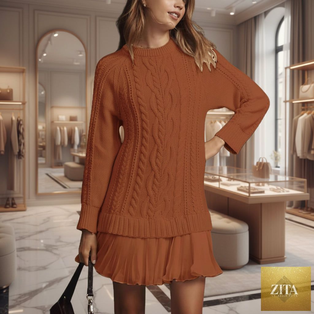 Oversized FitiqueFit cable knit sweater with round neck and long sleeves, showcasing its cozy, textured knit pattern.