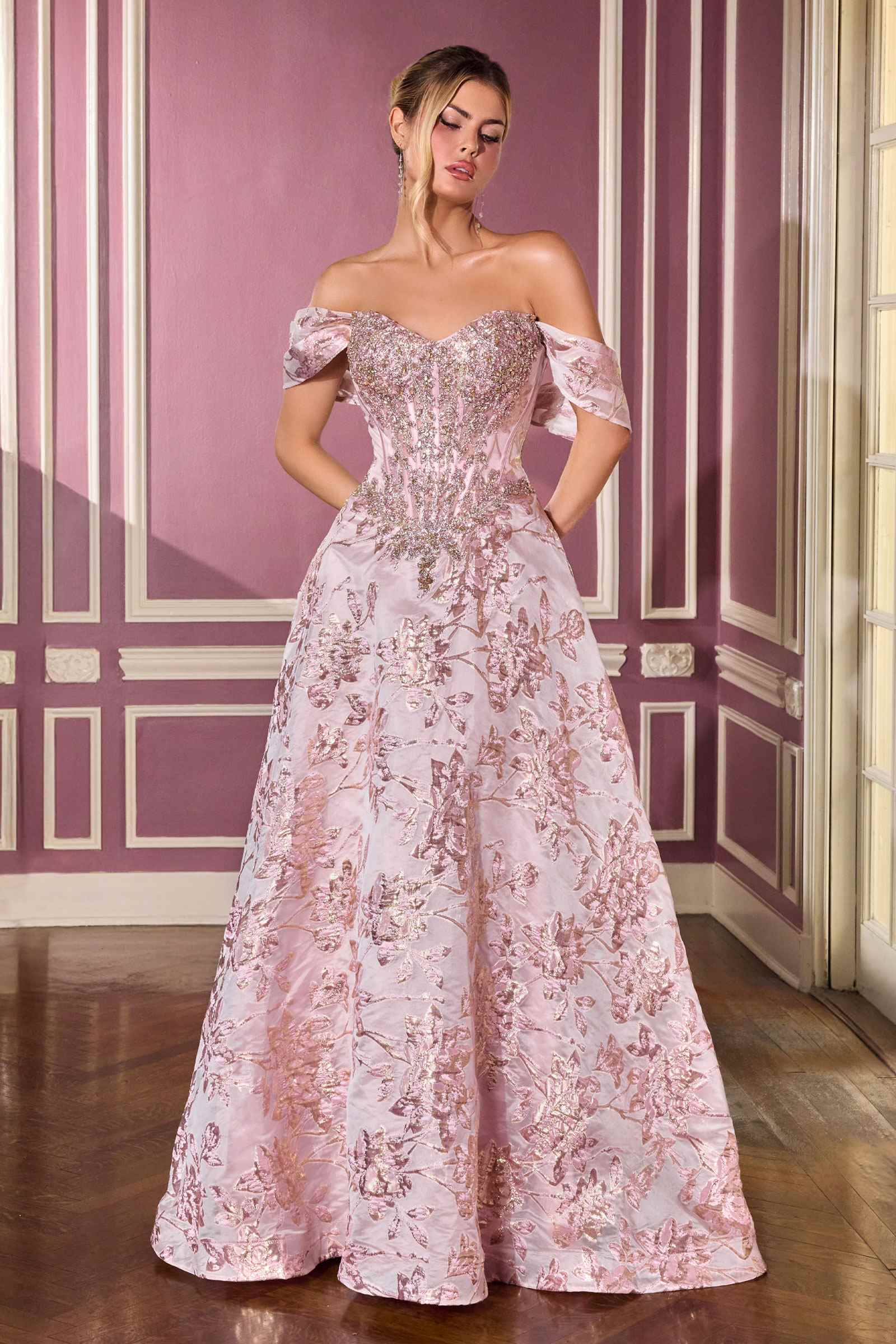 Pink Ladivine CD682 off-the-shoulder beaded bodice ball gown dress showing front view with intricate beadwork and flowing fabric.