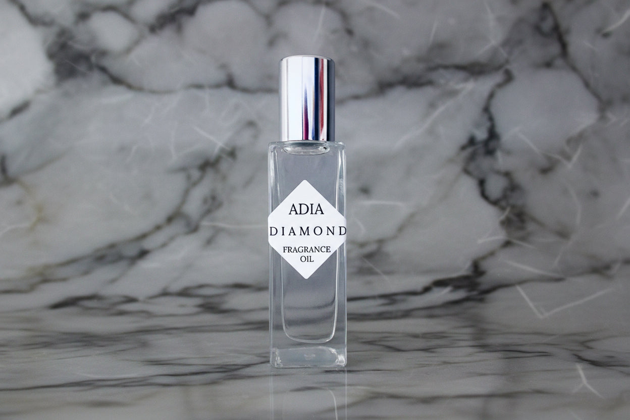 Diamond Natural Fragrance Oil by Adia Oils, close-up of the elegant glass bottle with a clear liquid scent oil inside.