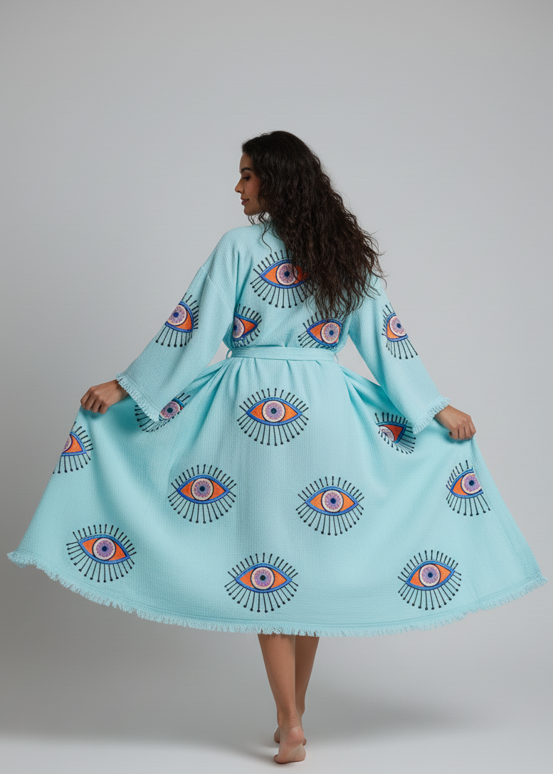 Buldano evil eye hand-printed kimono in turquoise color, featuring traditional design and natural fabric for a stylish, cultural look.