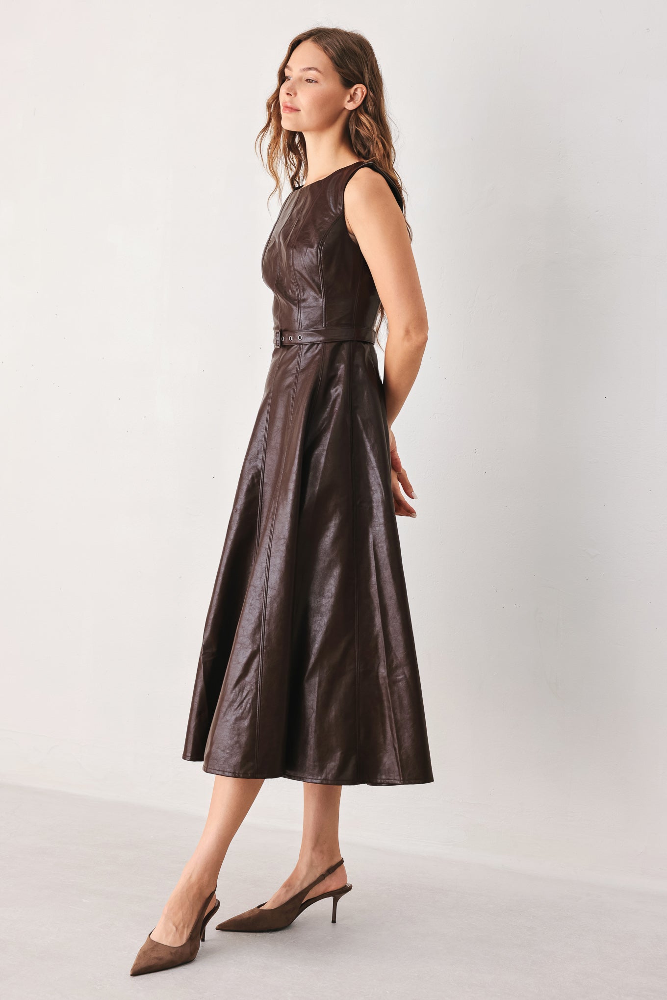 Dark brown faux leather midi dress by Flying Tomato, featuring a sleek, fitted design and stylish long sleeves.