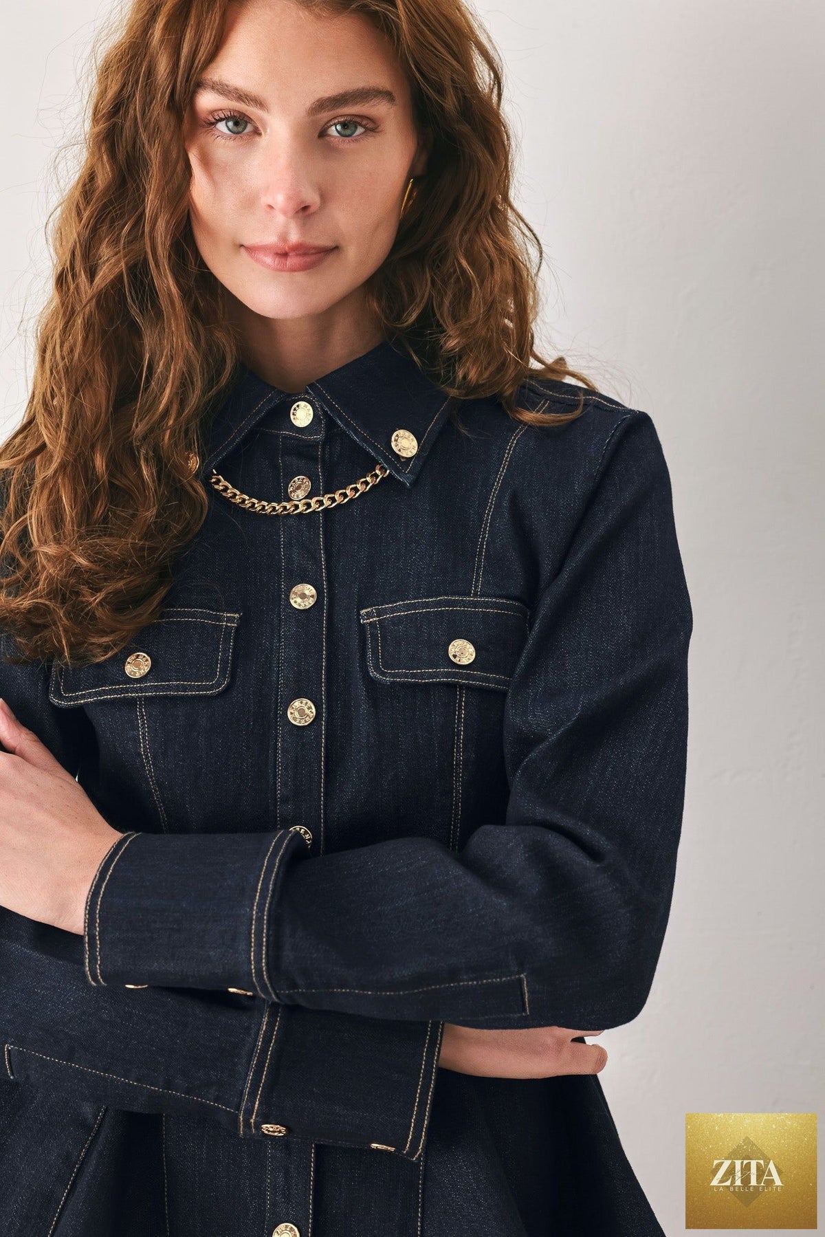INDIGO ICON DARK INDIGO CHAIN-DETAIL PEPLUM DENIM TOP