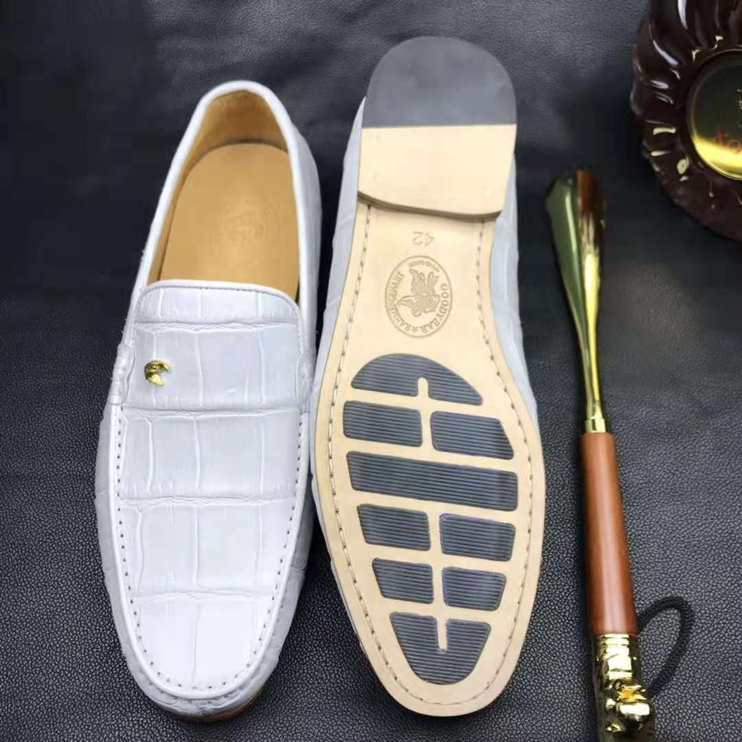White crocodile leather loafers by Don John, handmade men's dress shoes with a sleek, polished finish.