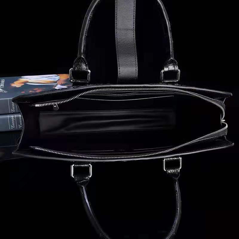 Don John men's luxury laptop bag in black genuine crocodile leather with a sleek messenger style and top handle.
