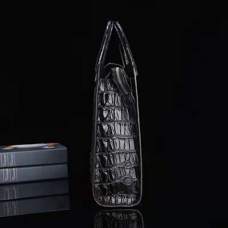 Don John men's luxury laptop bag in black genuine crocodile leather with a sleek messenger design.