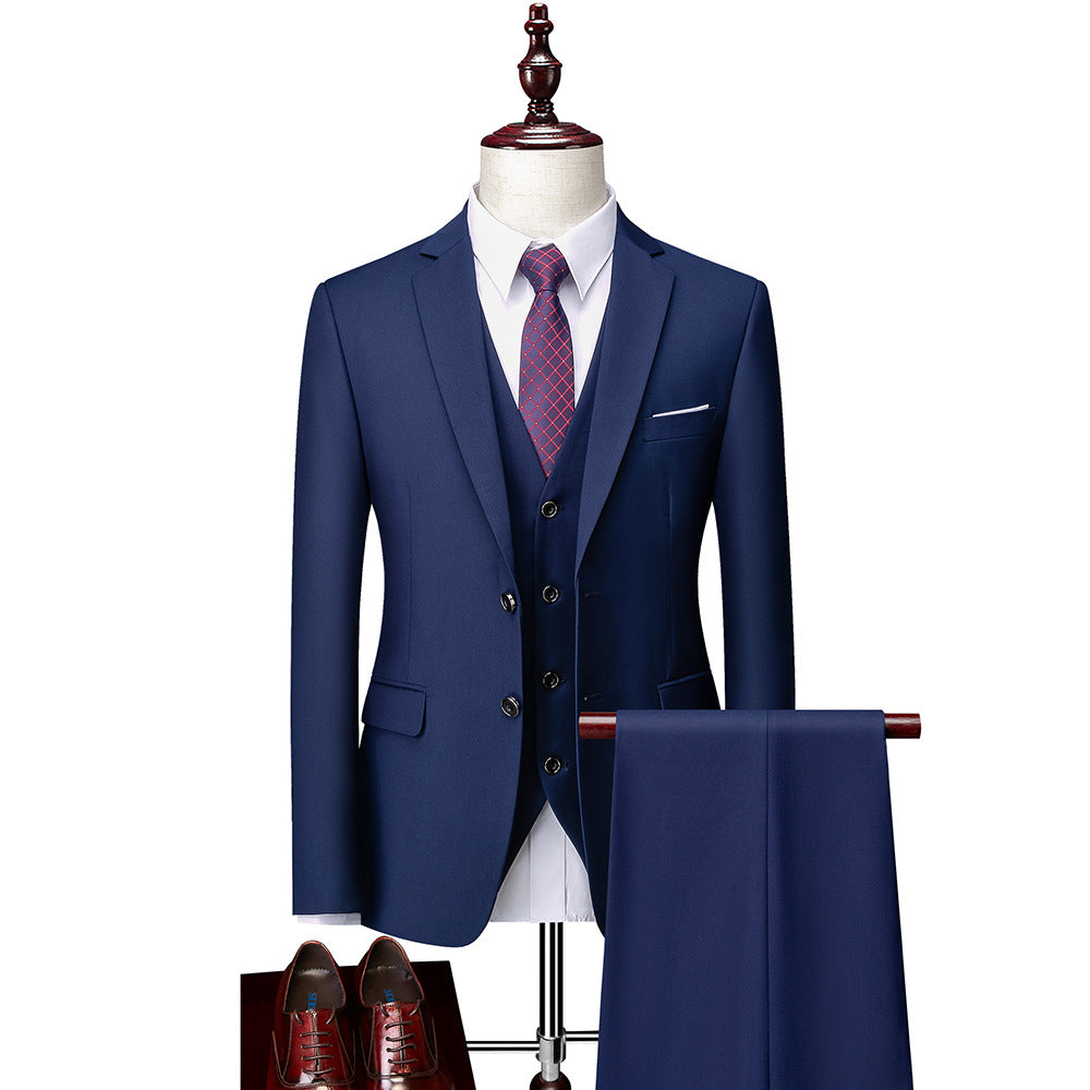 Men's 3-piece suit with jacket, pants, and vest in dark fabric, formal business attire by donjohnbyvictoriacharles.