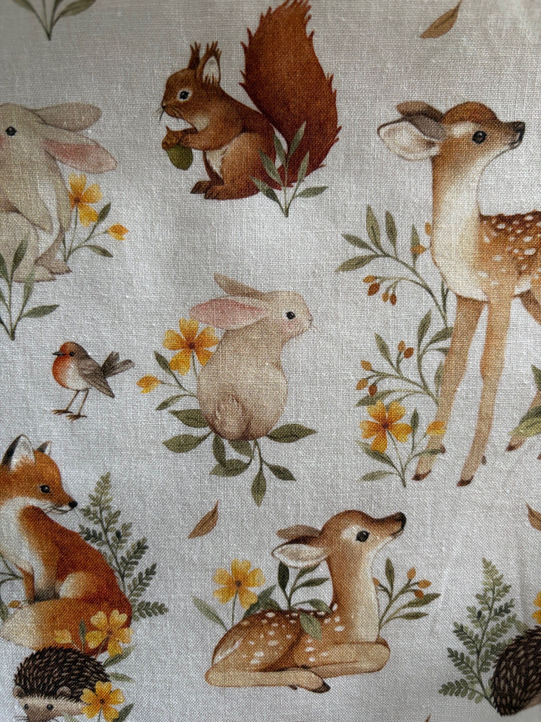 Woodland Animals Greta dress by Retrolicious featuring a charming woodland animal print and a flowing, vintage-inspired design.