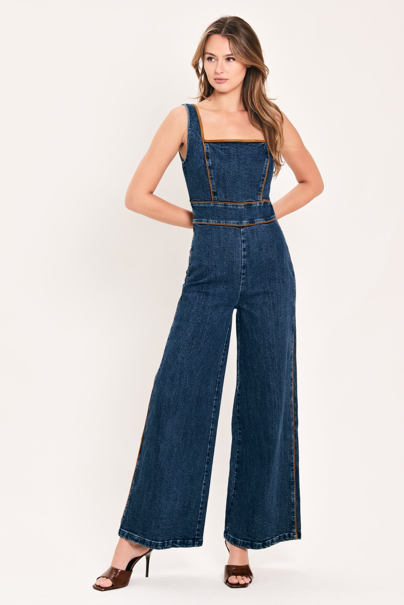 Flying Tomato Western Star Daydream denim jumpsuit with medium indigo wash, featuring a stylish and comfortable one-piece design.
