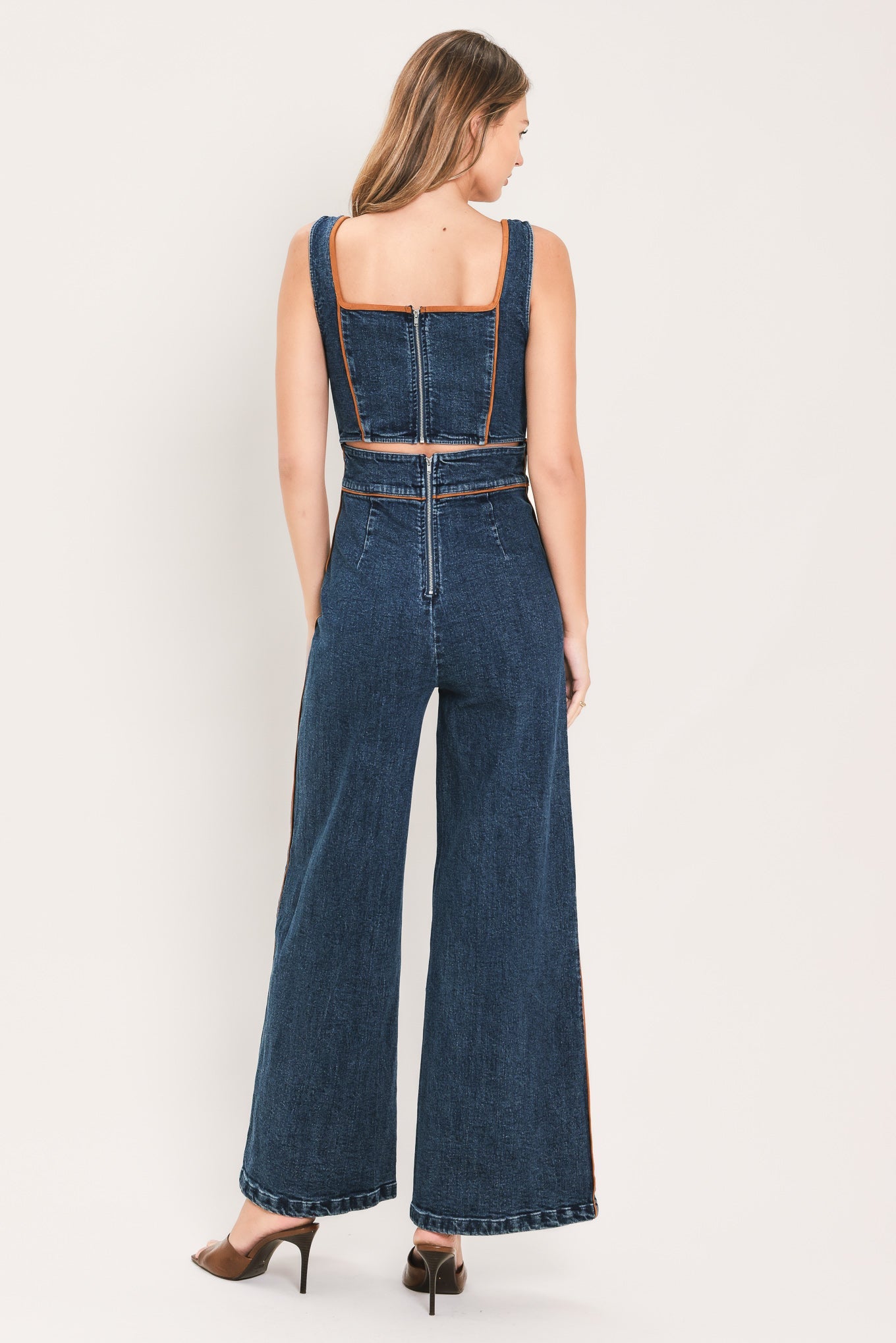 Flying Tomato Western Star Daydream denim jumpsuit in medium indigo, featuring a casual fit and classic denim texture.