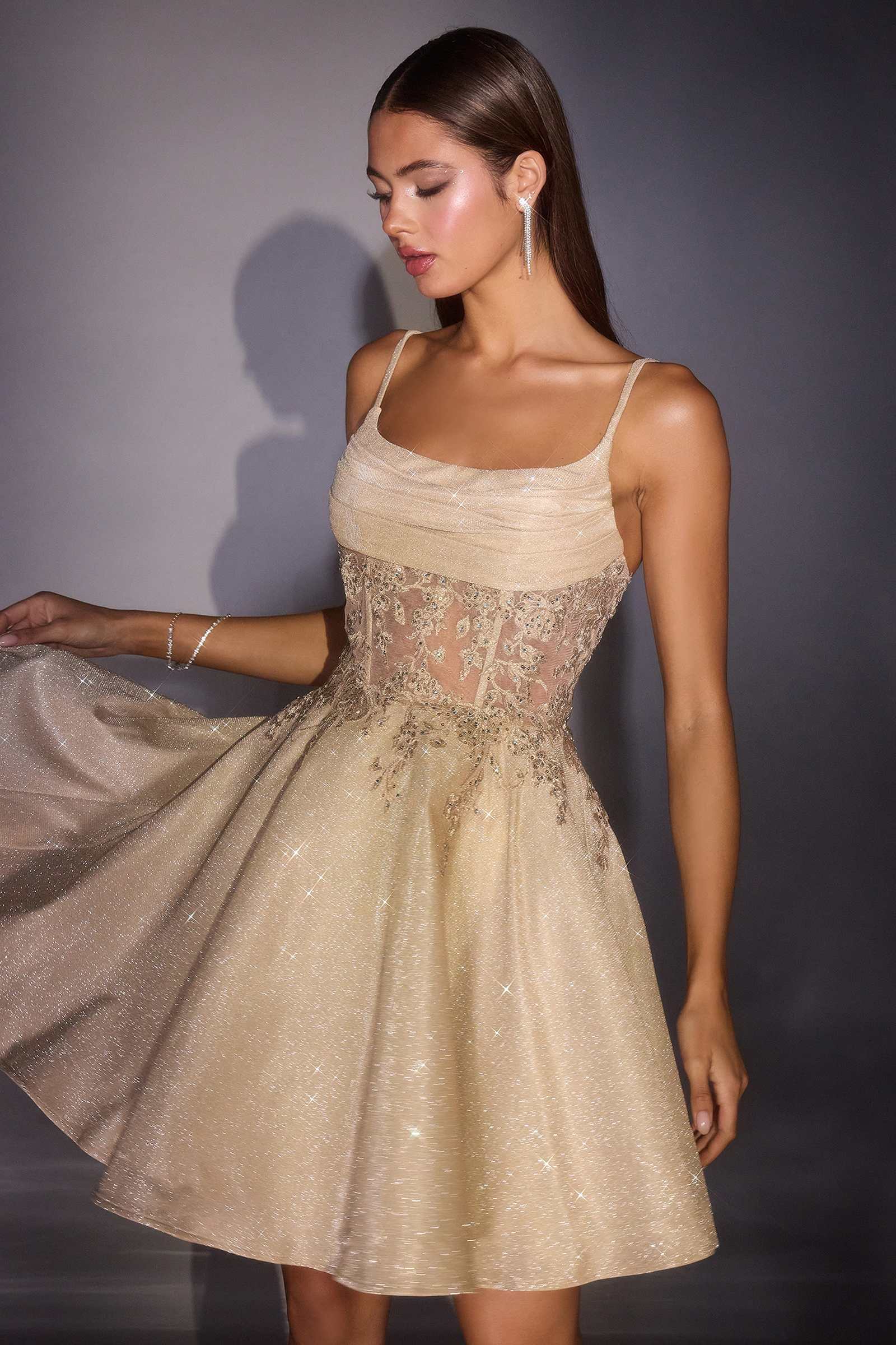 Champagne Ladivine fit and flare glitter shimmer homecoming dress with elegant design and sparkling details.