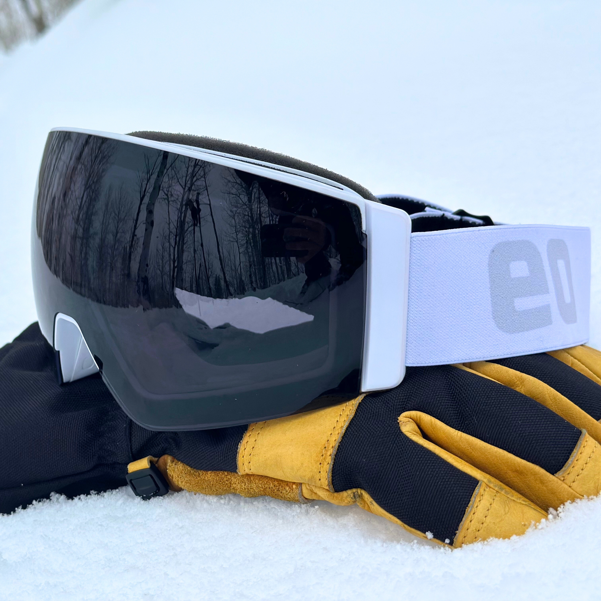 Photochromic MACH SCHNELL MAG ski and snowboard goggles by Eastern Outer with gray lenses for versatile outdoor vision.