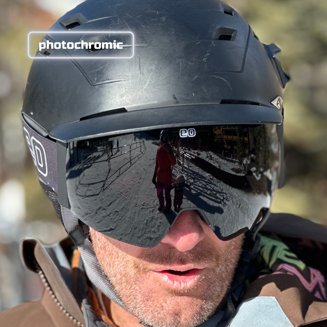 Eastern Outer Mach Schnell Mag photochromic ski and snowboard goggles with dark lenses and adjustable straps.