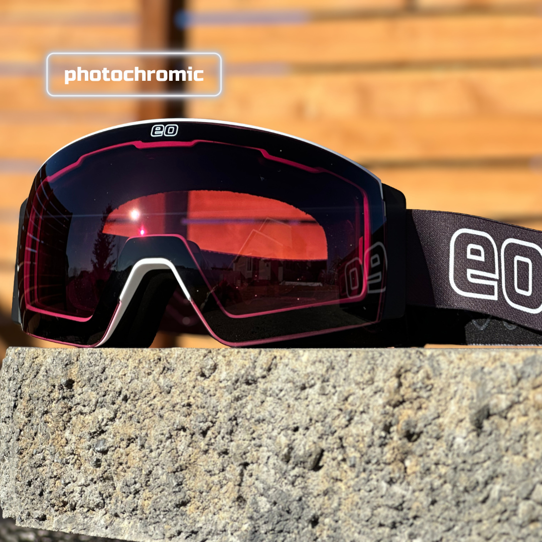 Eastern Outer MACH SCHNELL MAG photochromic ski and snowboard goggles with black frame and rose-tinted lenses.