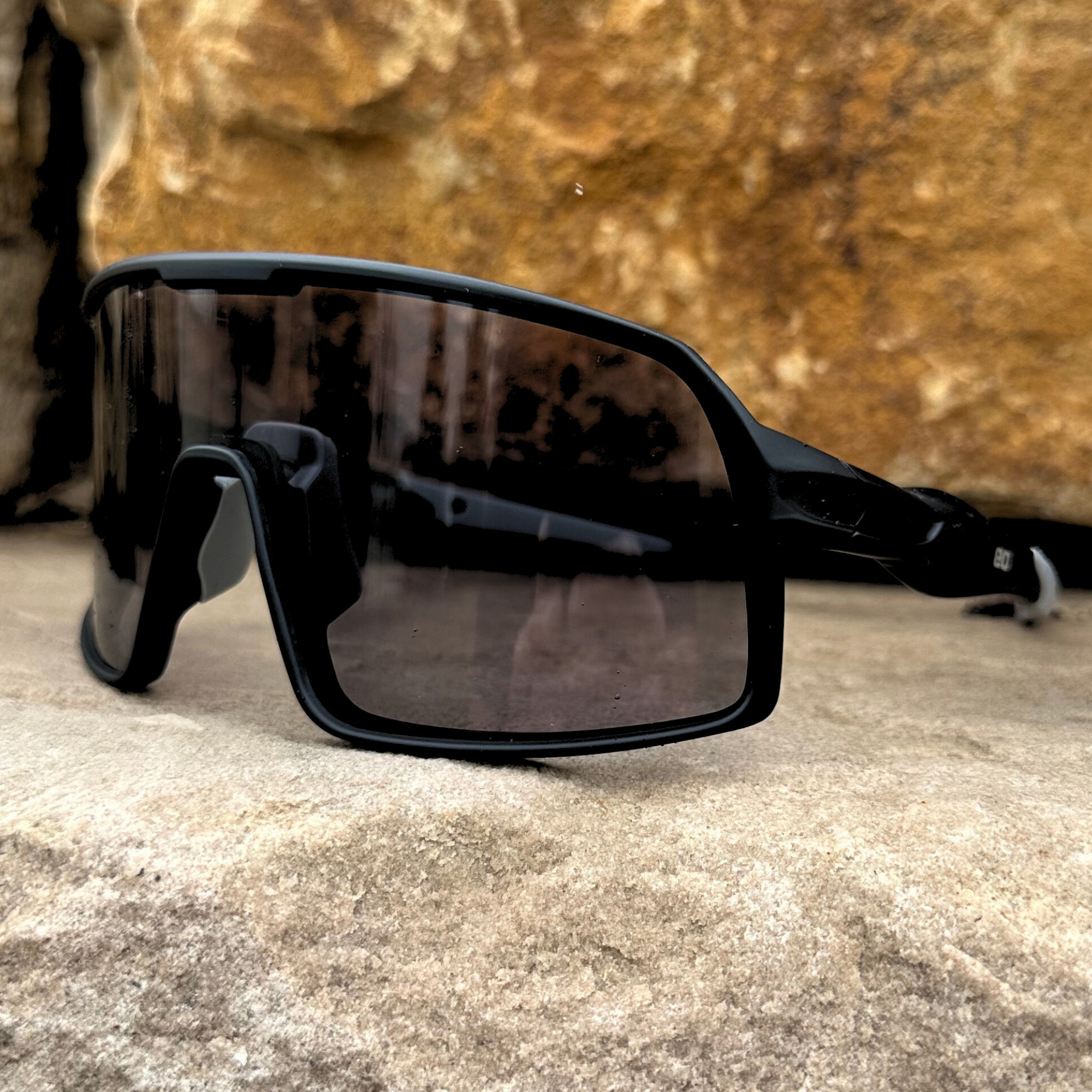 Eastern Outer Mojave sunglasses with photochromic lenses, shown from outside angle in black frame