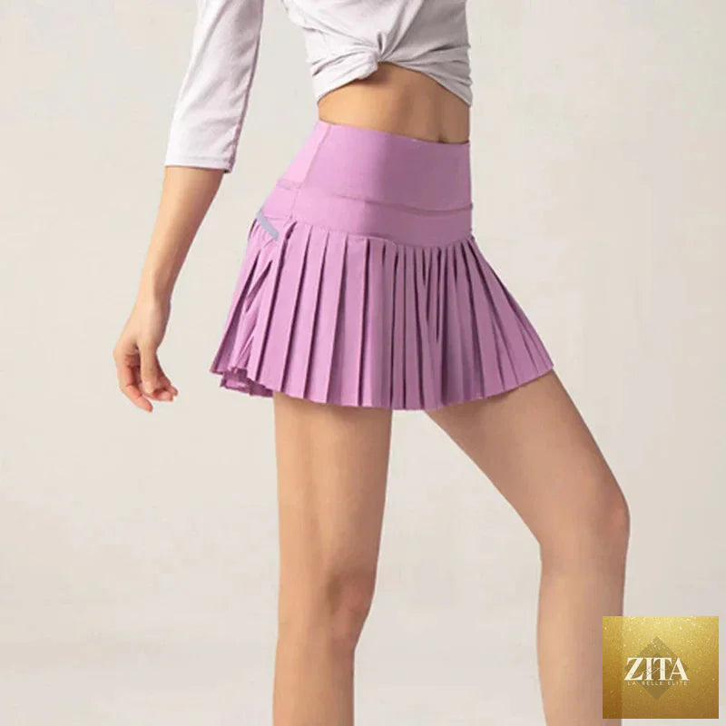 Onyx Flow Pleated Athletic Skirt – Built-In Shorts & Pockets