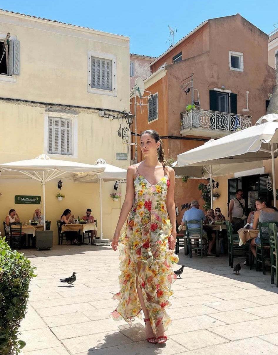 Elegant off-the-shoulder chiffon evening gown for women featuring a printed ethereal design and long flowing silhouette.