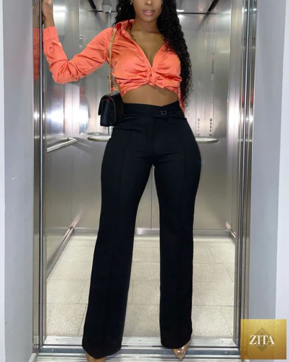 Women’s casual wide-leg pants in neutral autumn colors, featuring a fashionable bootcut style, from Wanita Store.