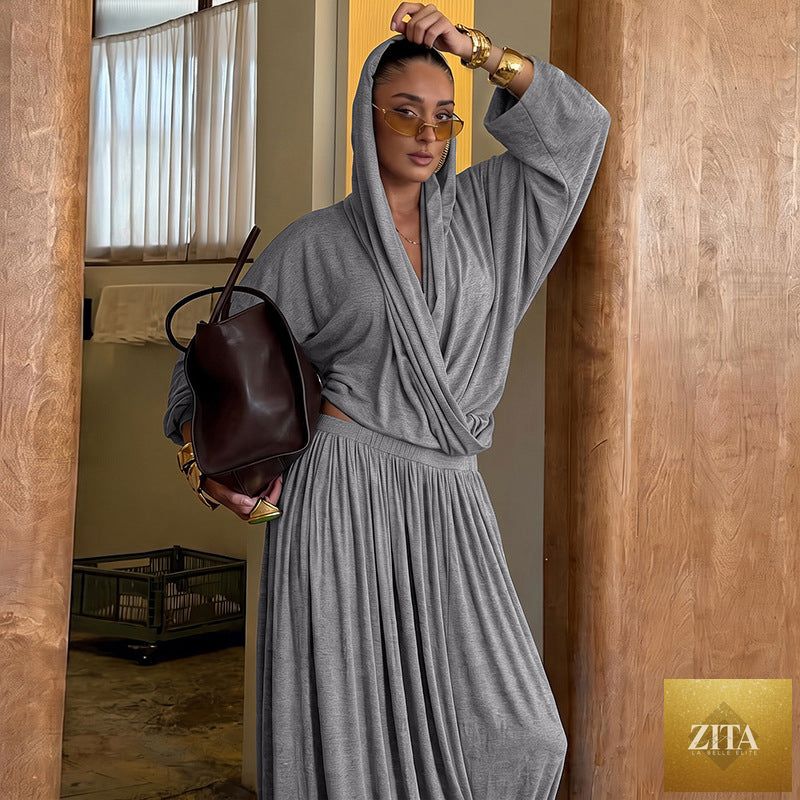 Bella Mia women's summer clothing set with a solid hooded long sleeve top and pleated loose maxi skirt in light fabric.