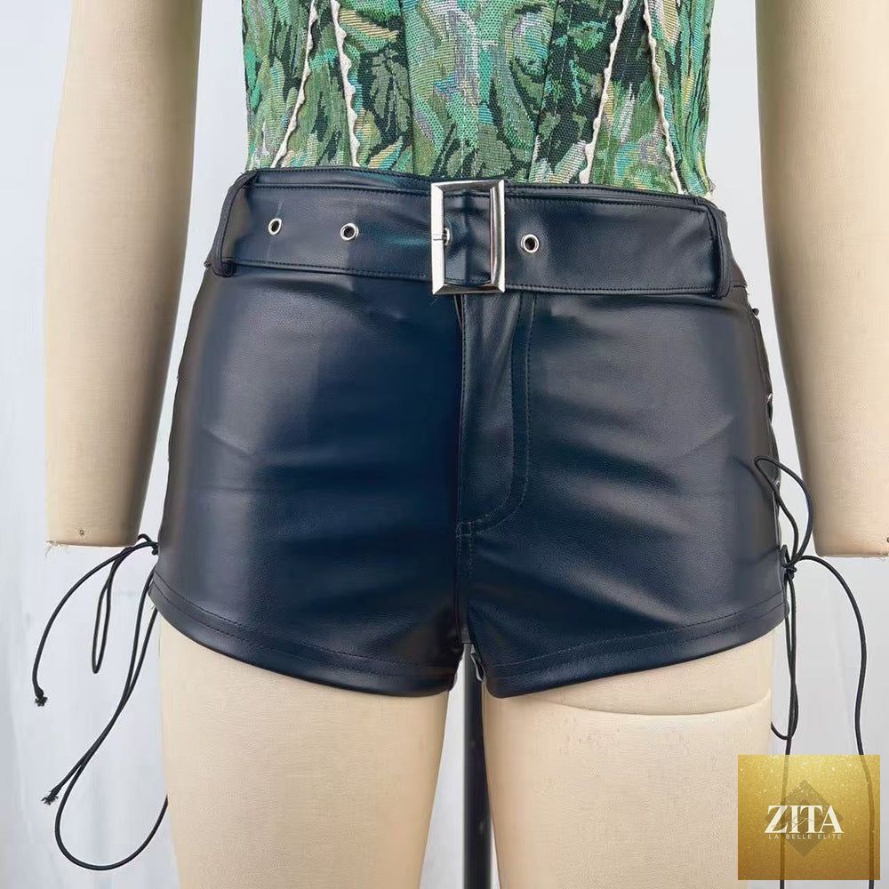 Women’s leather low-waisted shorts by Bella Mia with lace-up front and belt, featuring a sexy, stylish design.