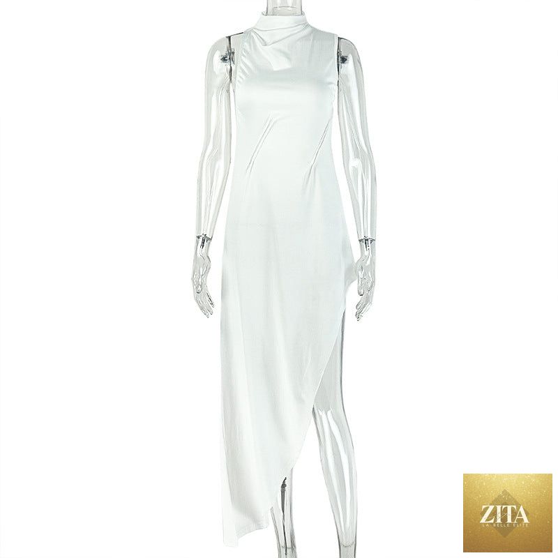 Solid color Bella Mia sleeveless backless maxi dress with high collar, asymmetric design, slim fit, and simple elegant style.