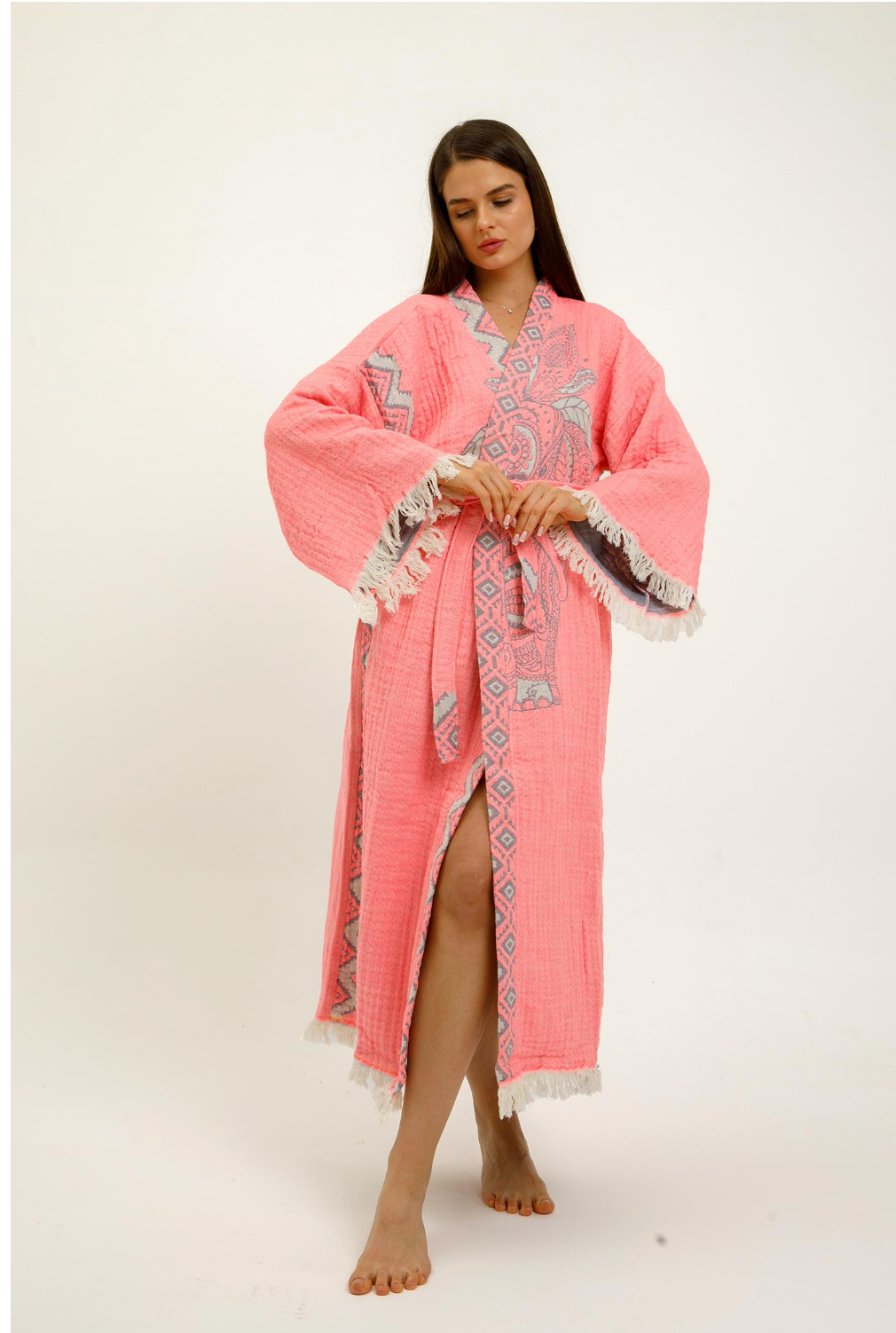 Pink jungle-themed kimono by Buldano featuring elephant print, soft fabric, and traditional kimono style for a stylish, comfortable look.