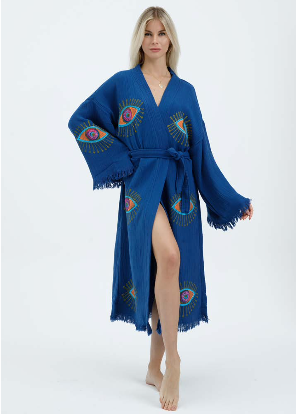 Hand-printed blue evil eye kimono by Buldano, featuring natural fabric and traditional design, displayed on a neutral background.